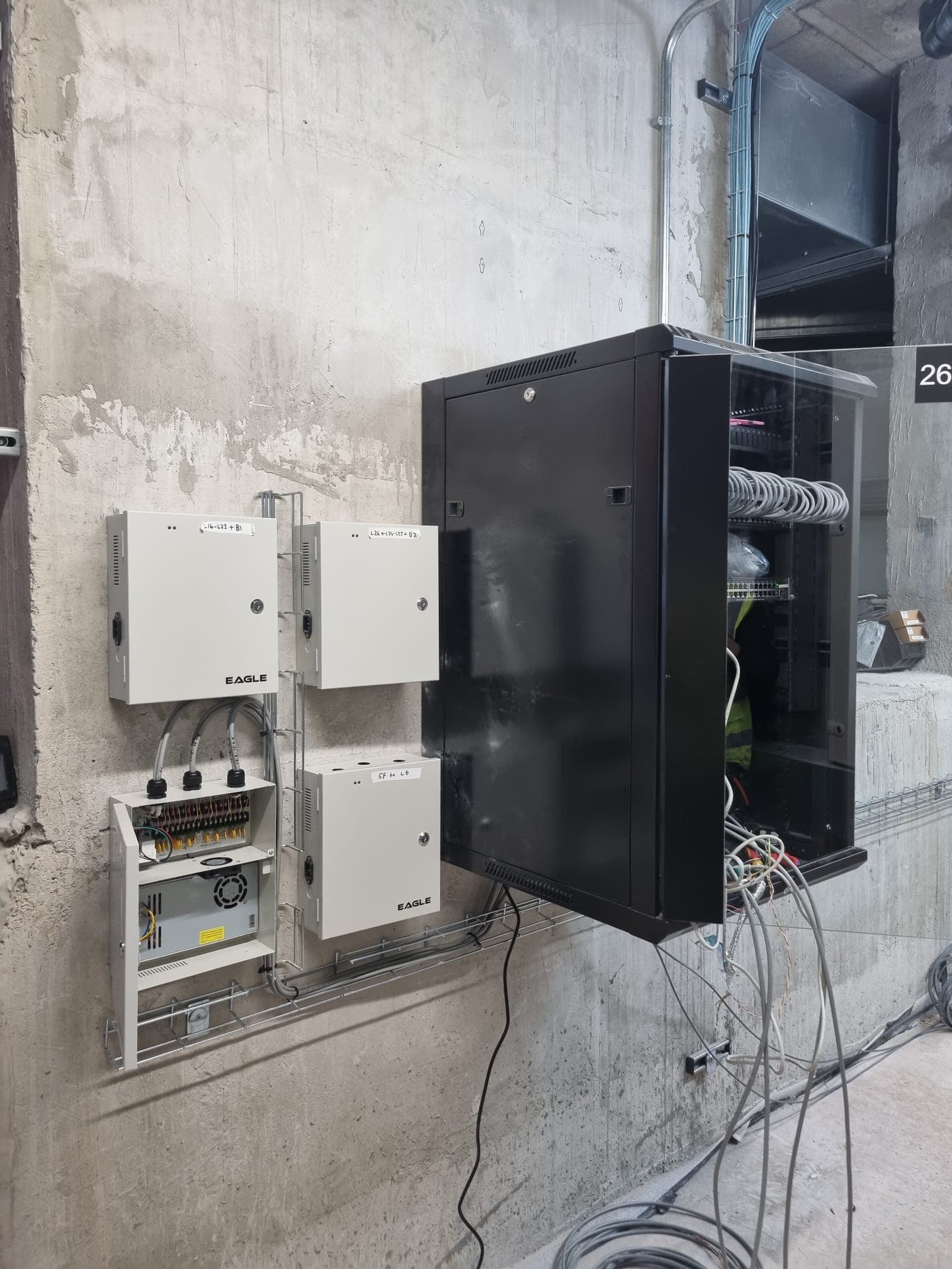 Control panels and server rack with cable tray routing