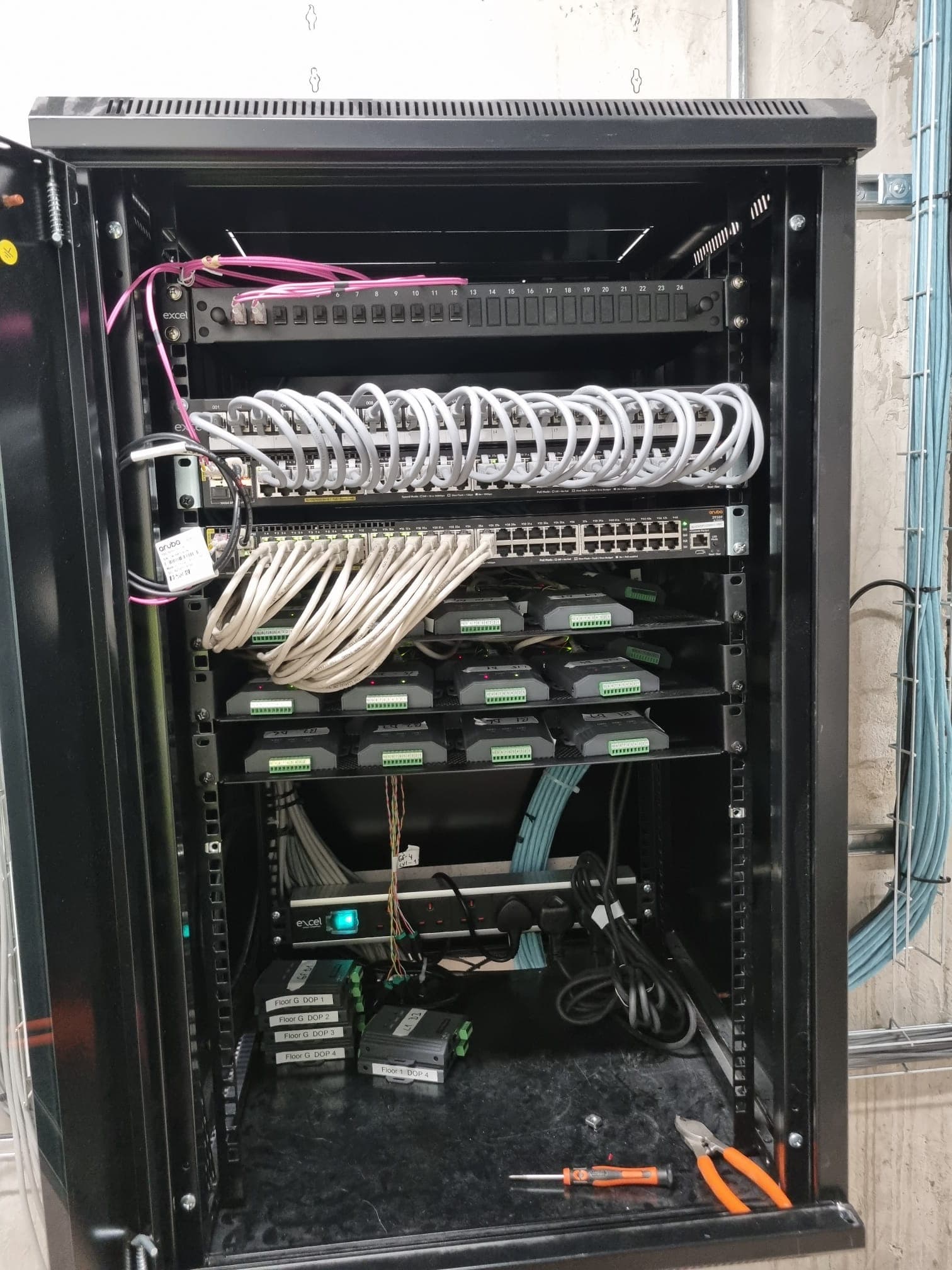 Aruba networking rack with floor distribution modules